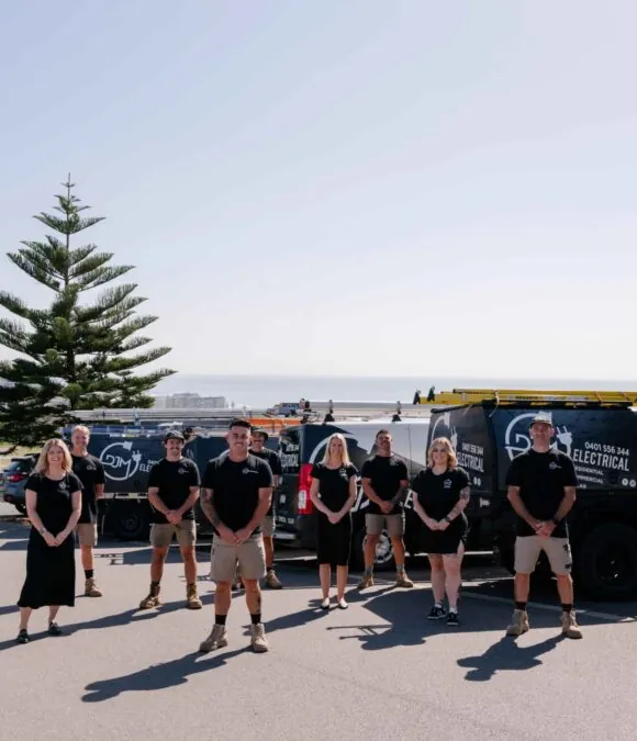The DJM Electrical team with their fleet in Newcastle